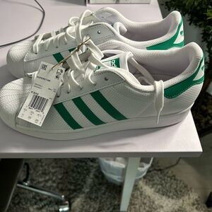 Men’s Adidas Superstar sneakers, green and white